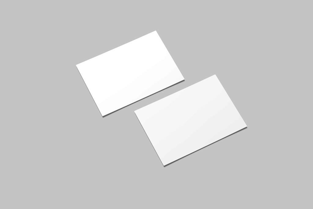 Coated and uncoated paper displayed on neutral background