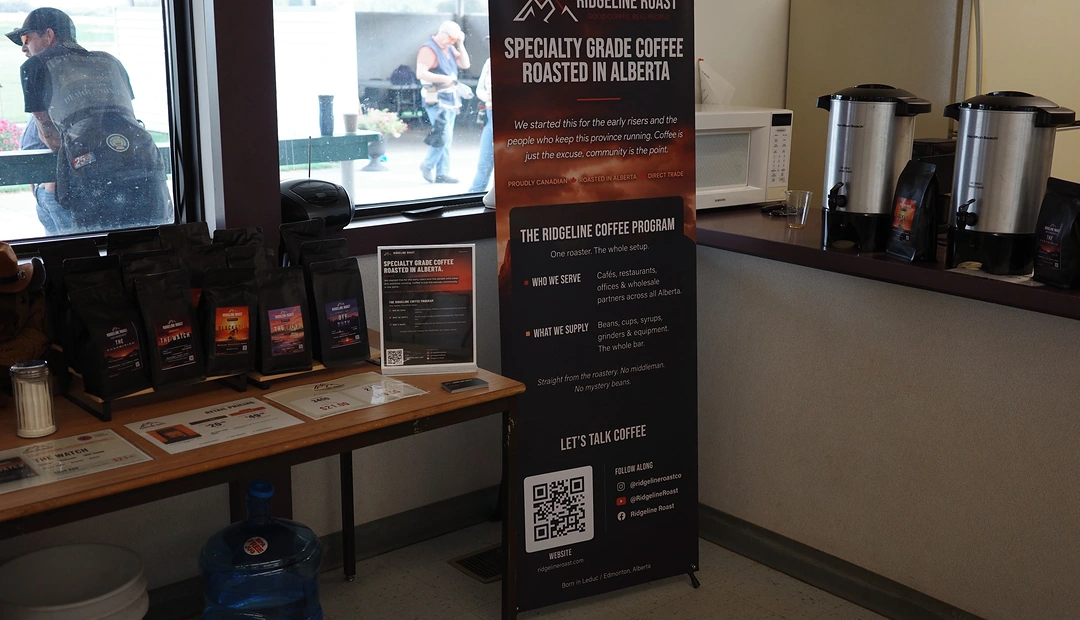 Ridgeline Roast specialty coffee display with custom promotional banner and printed materials, printed at Little Rock Printing.